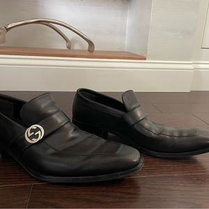 Men’s black Gucci loafers